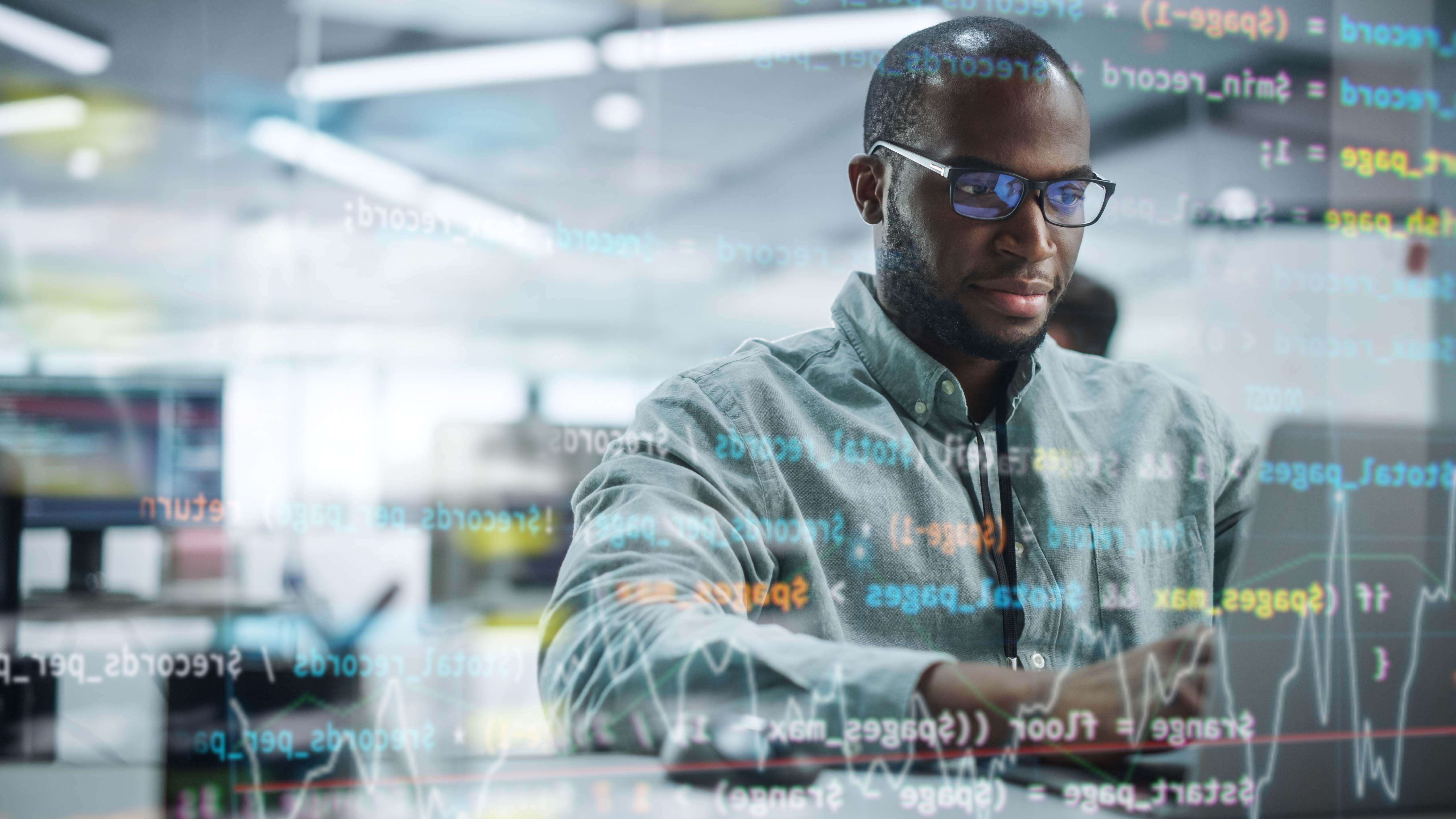 man looking at screen