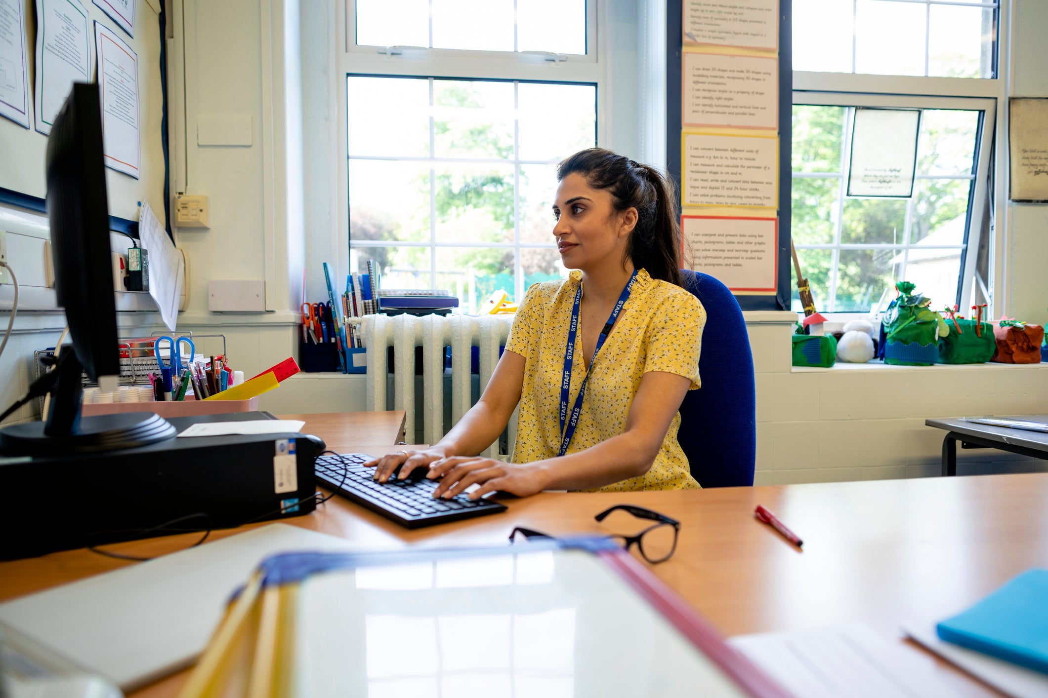 teacher at computer