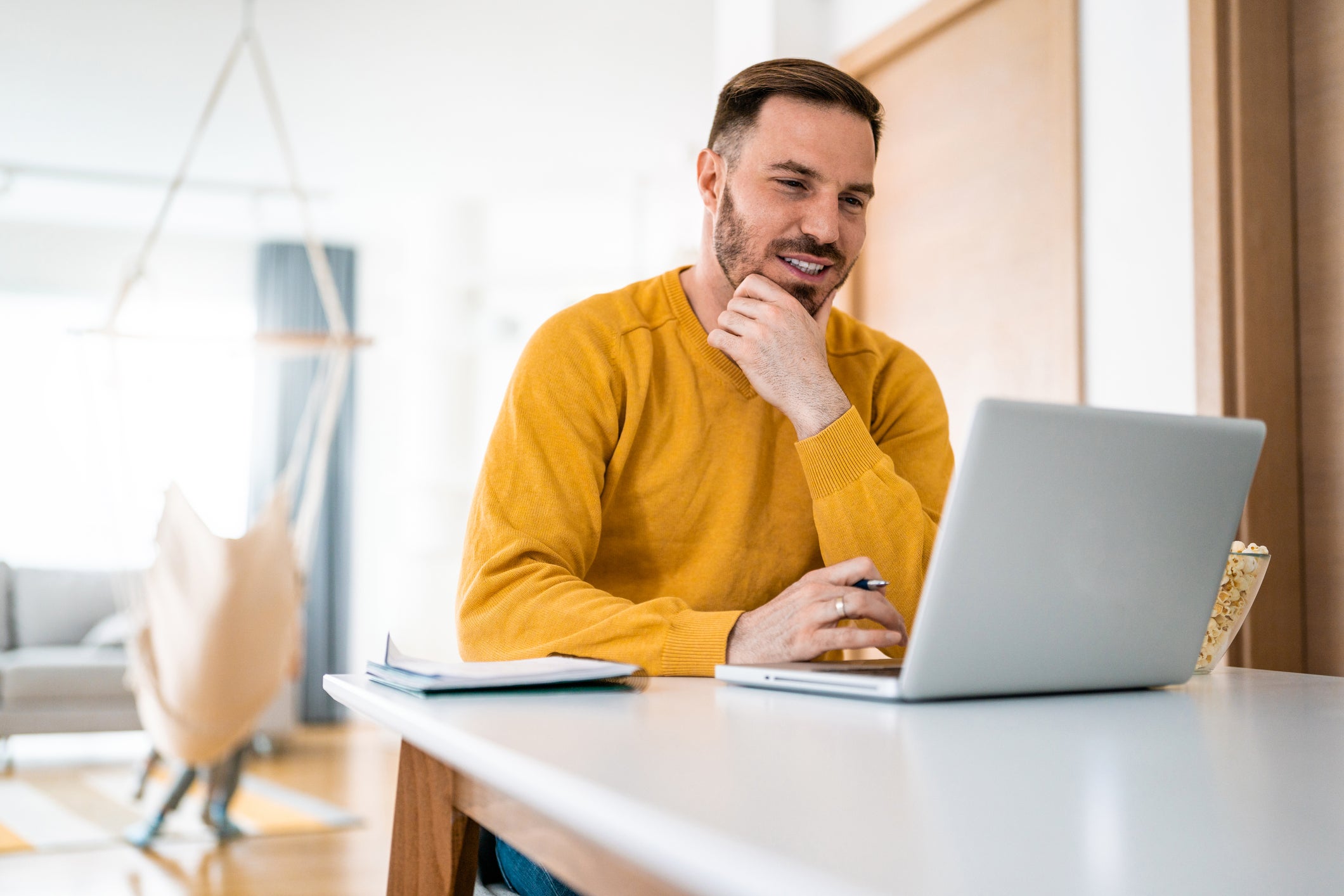 man looking at laptop