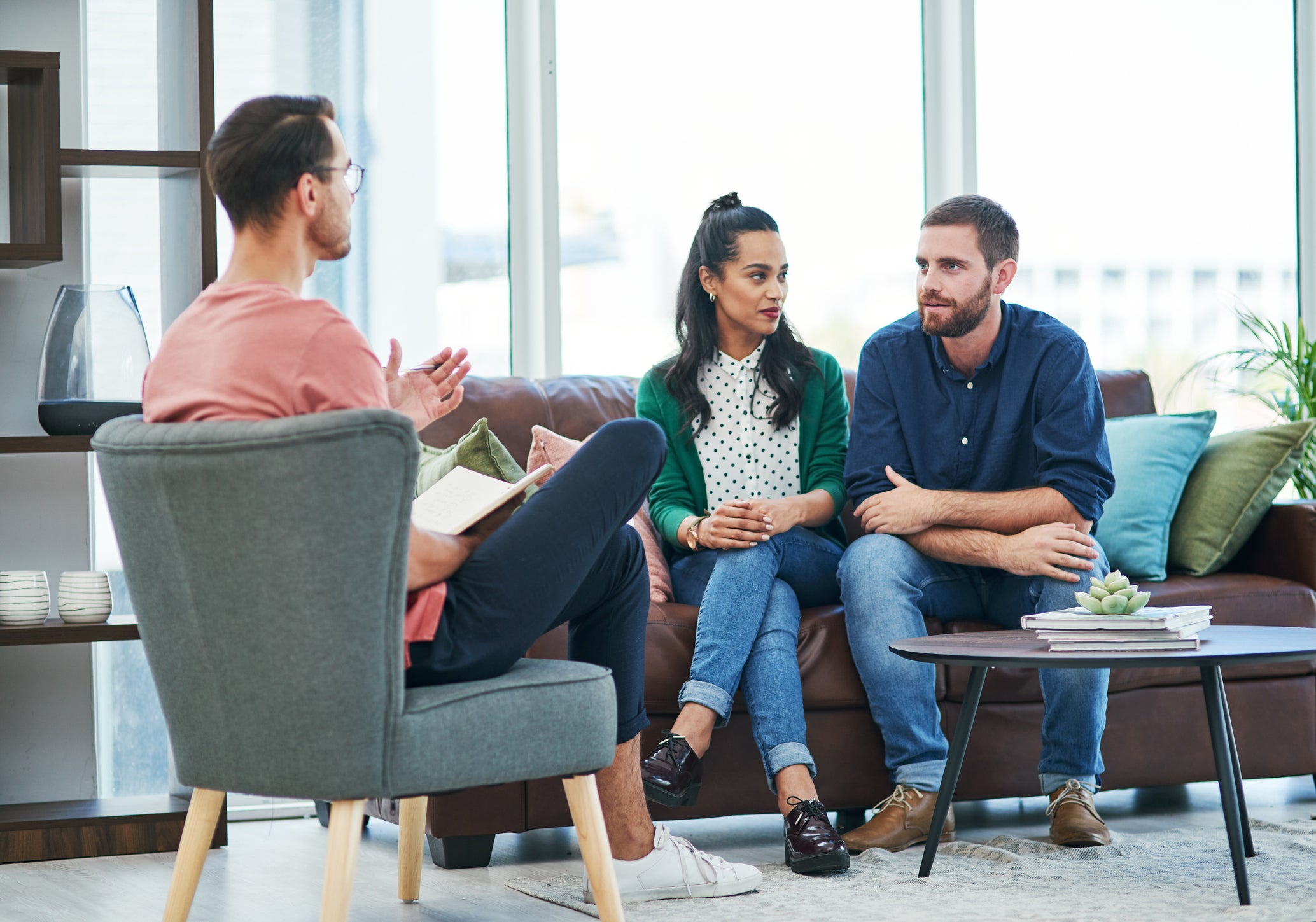 therapist talking to a couple
