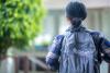 student wearing alliant backpack
