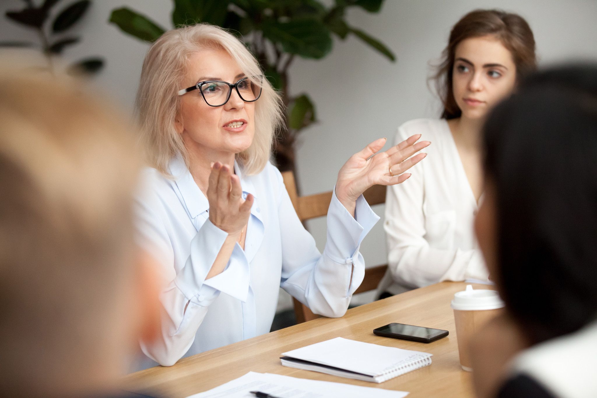 woman gesturing in meeting