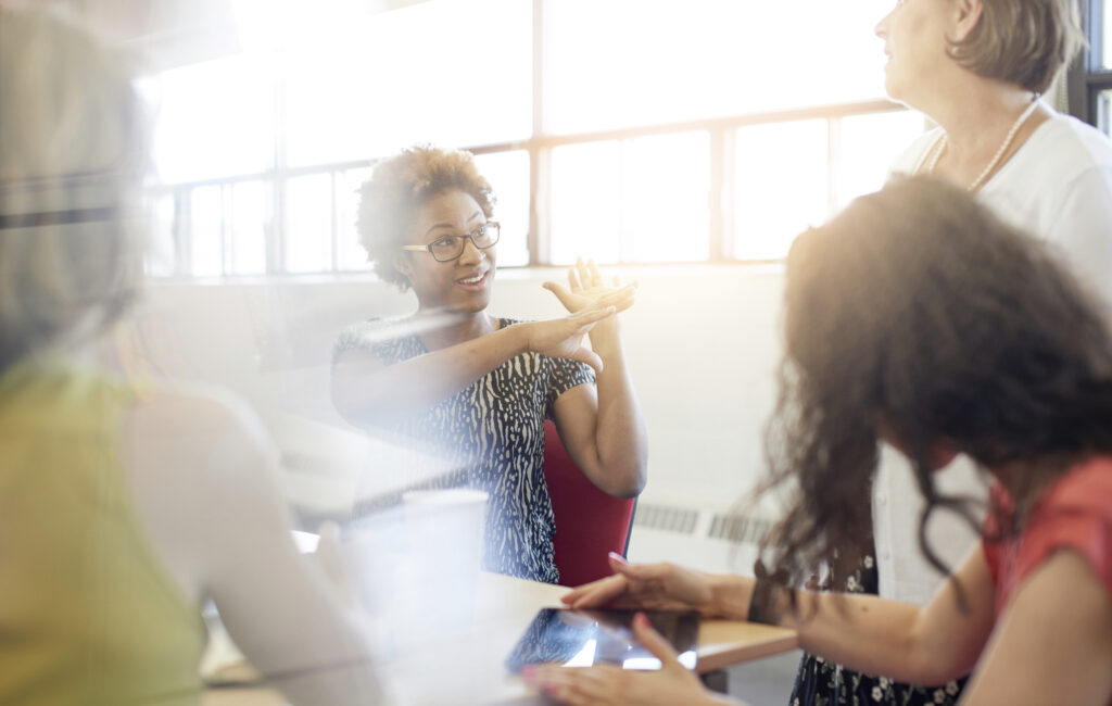 woman administrator talking to group