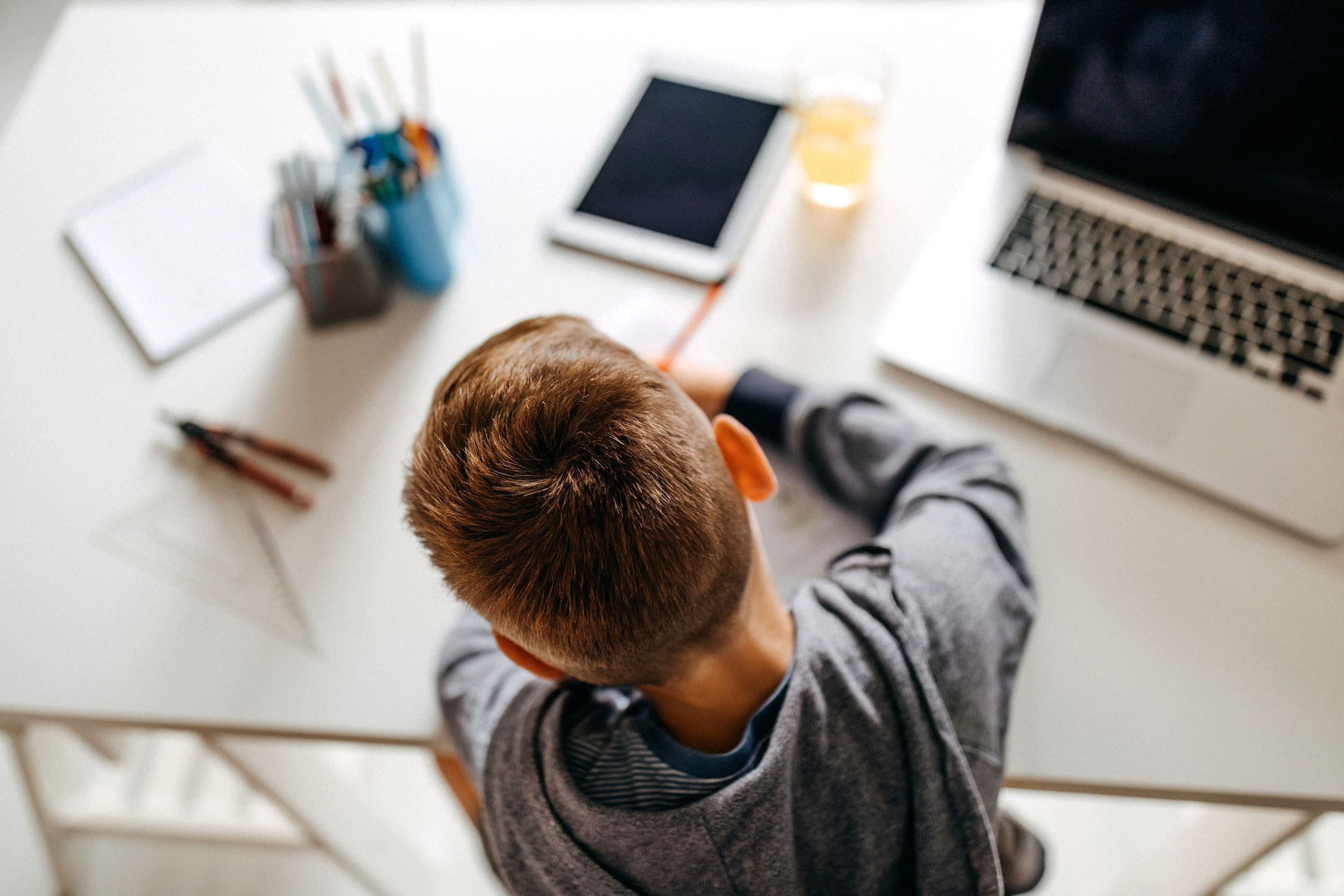 boy studying at desk