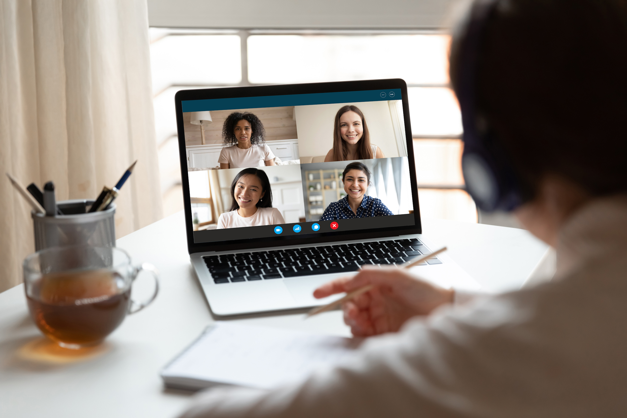 group of women on video meeting