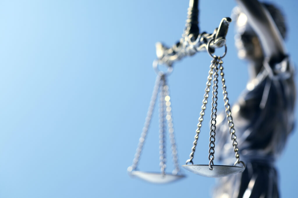 statue holding weight in balance