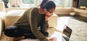 woman on laptop researching