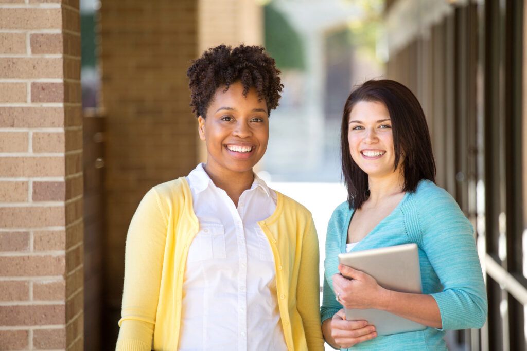 two women doctorate in educational leadership students
