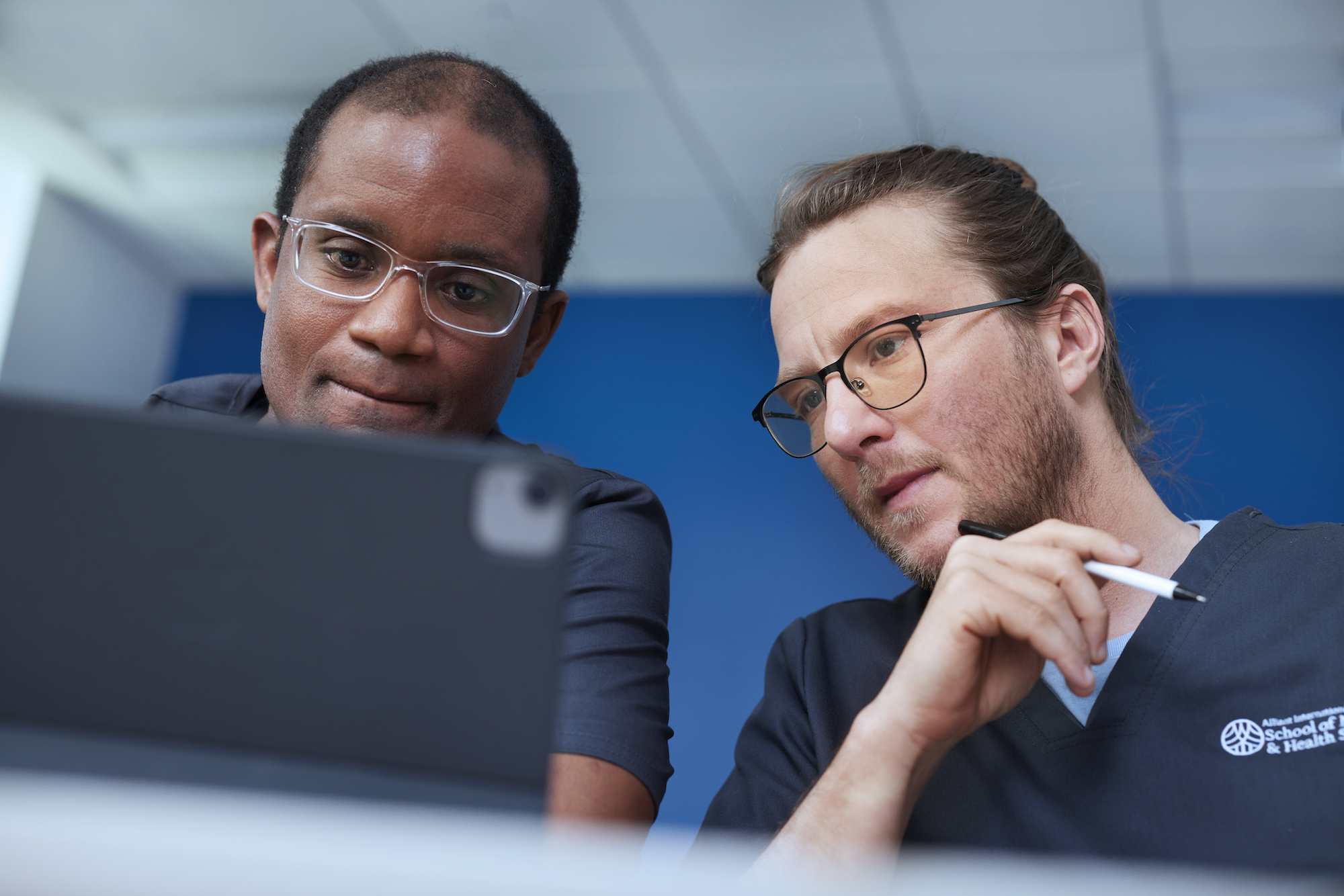 Alliant Nursing Students looking at tablet