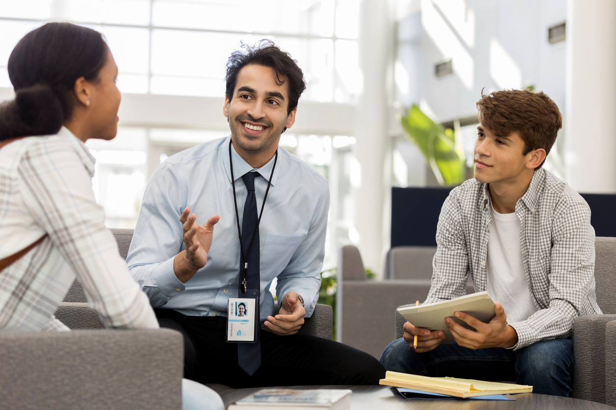 school psychologist talking with students