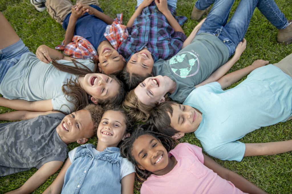 kids laying down in circle