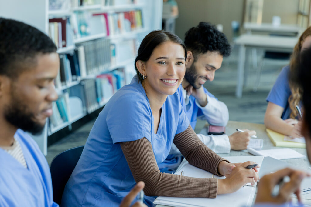 nurse in a meeting with other nurses