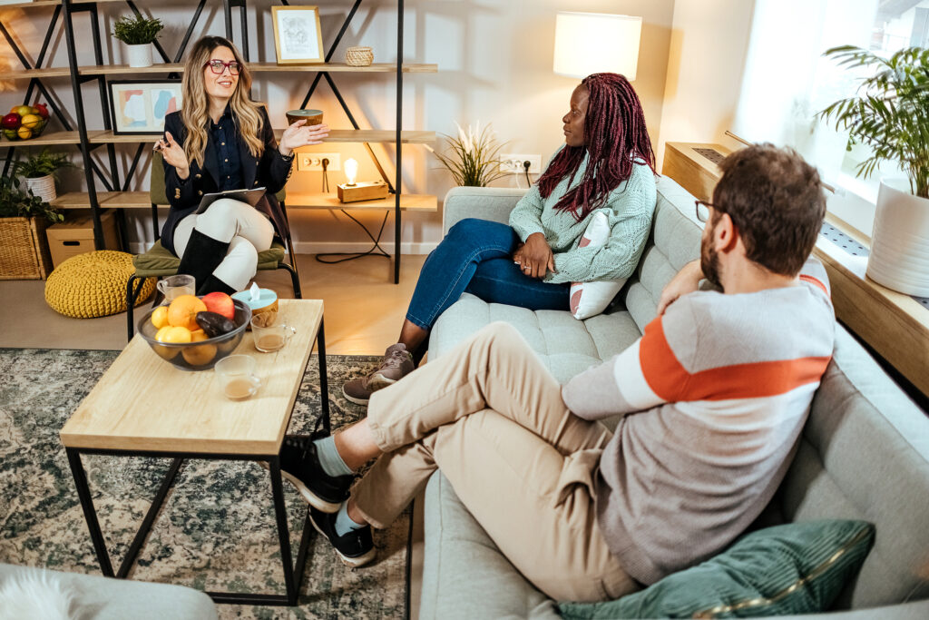 therapist talking to a couple