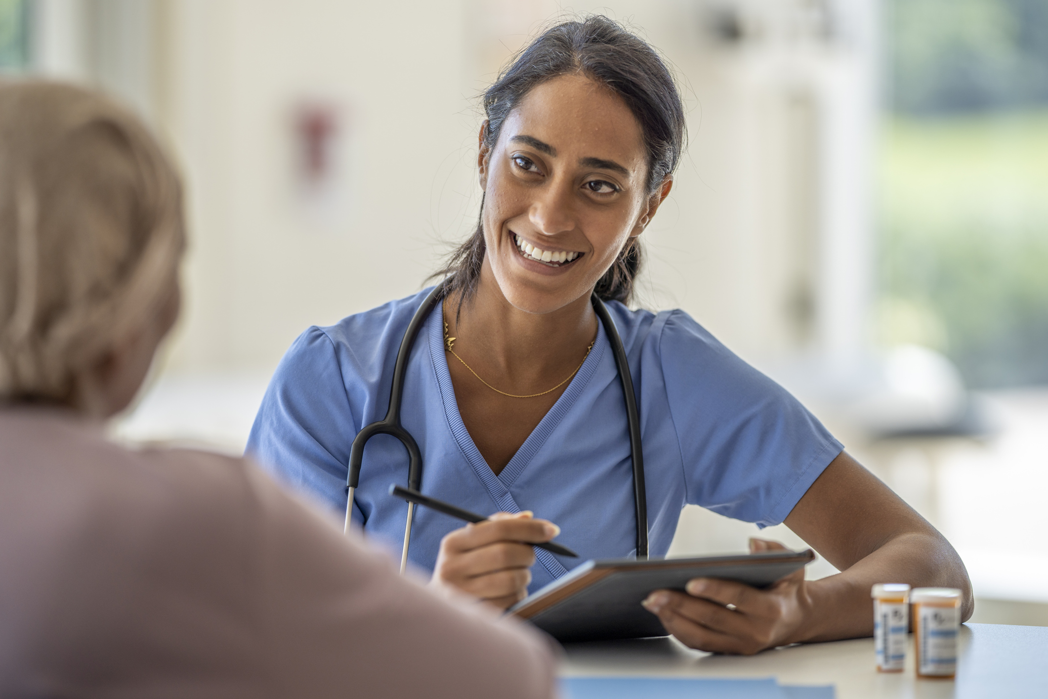 Nurse talking to a patient