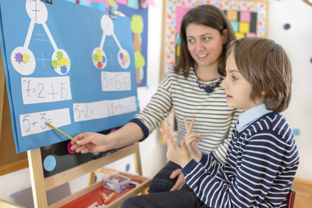 a teacher engaging with a student