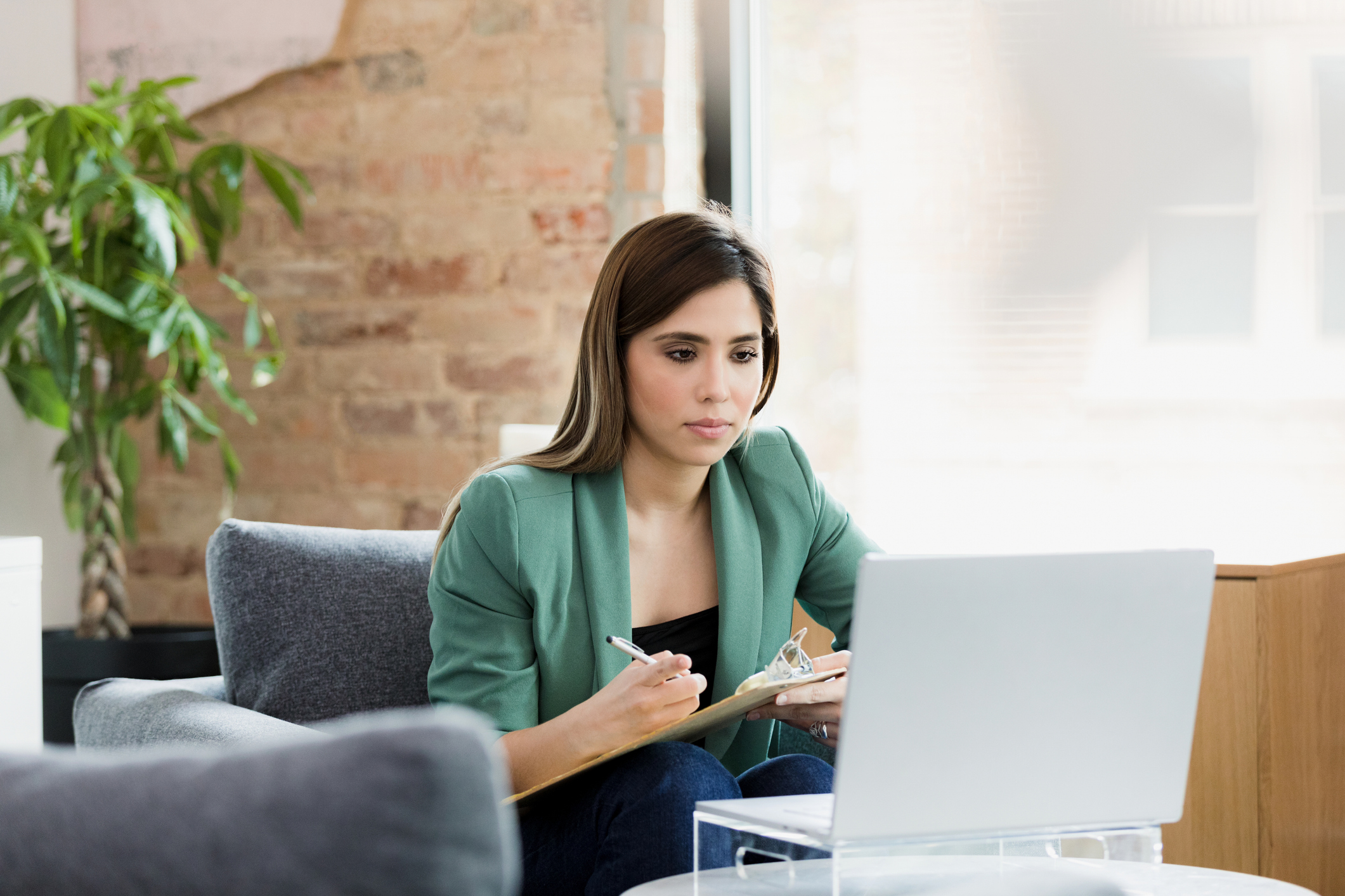 woman looking at a laptop