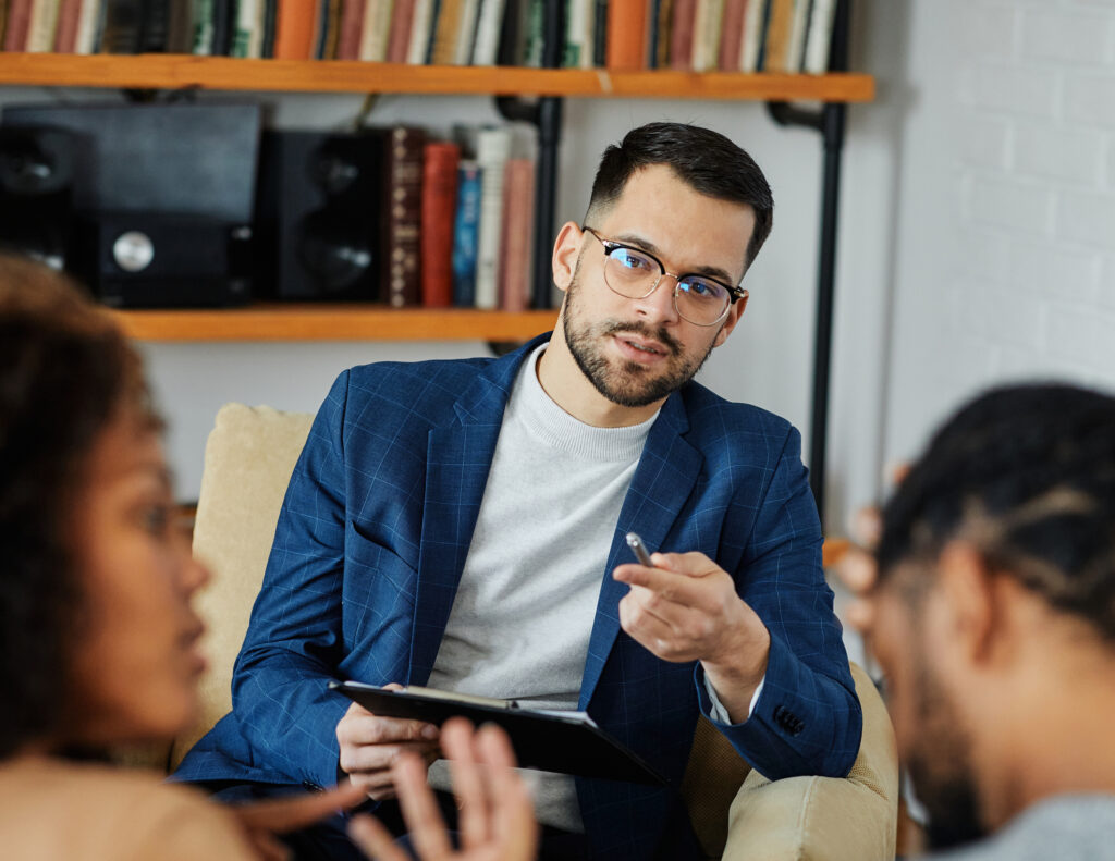 therapist talking to a couple
