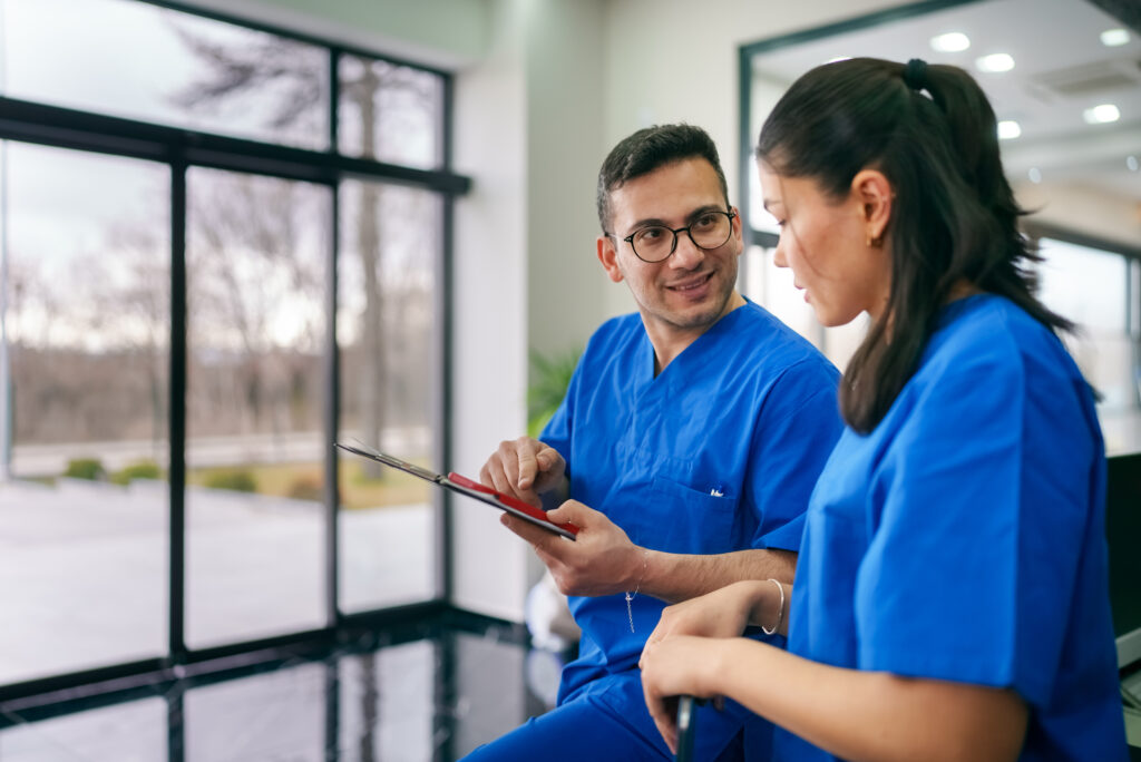 Nurse talking to another nurse