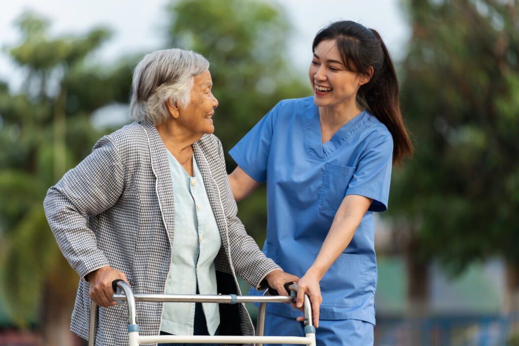 Nurse helping older woman