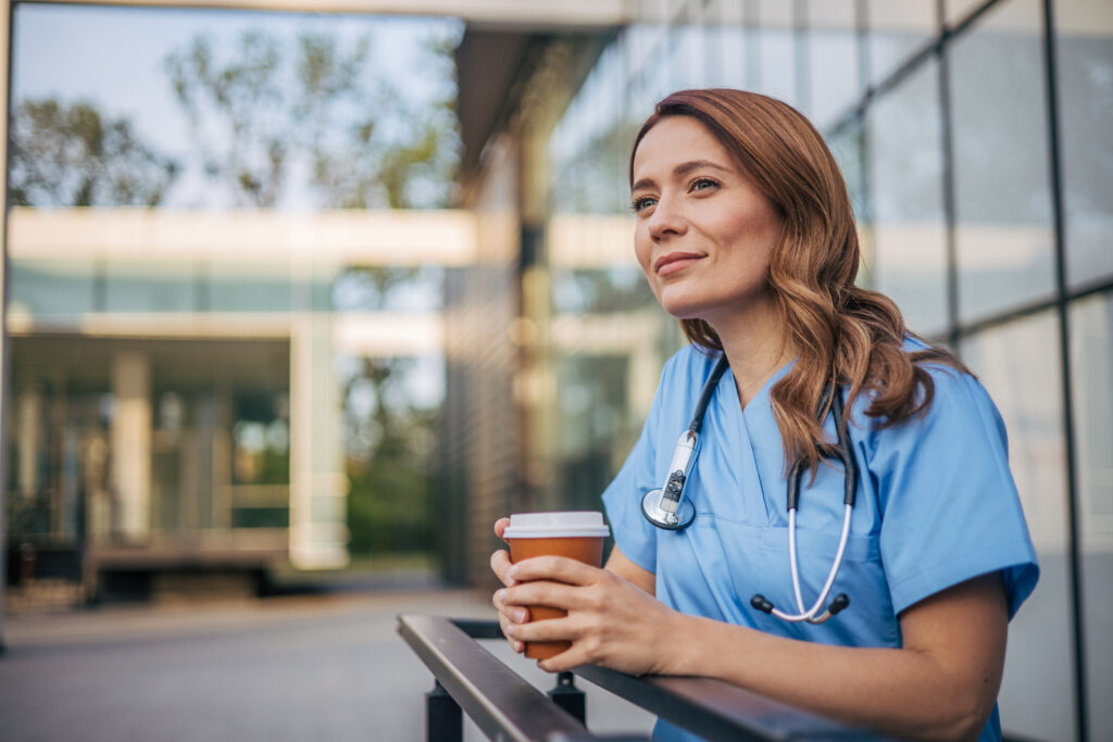 Nurse with coffee in hand
