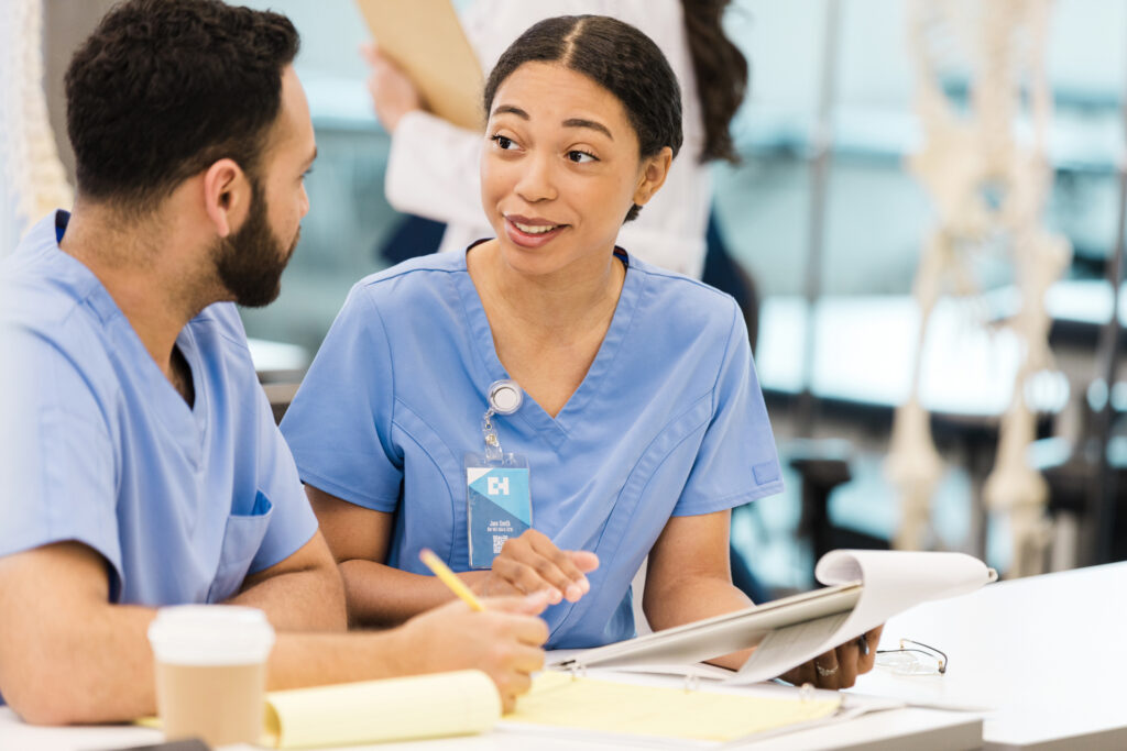 two nurses talking to each other