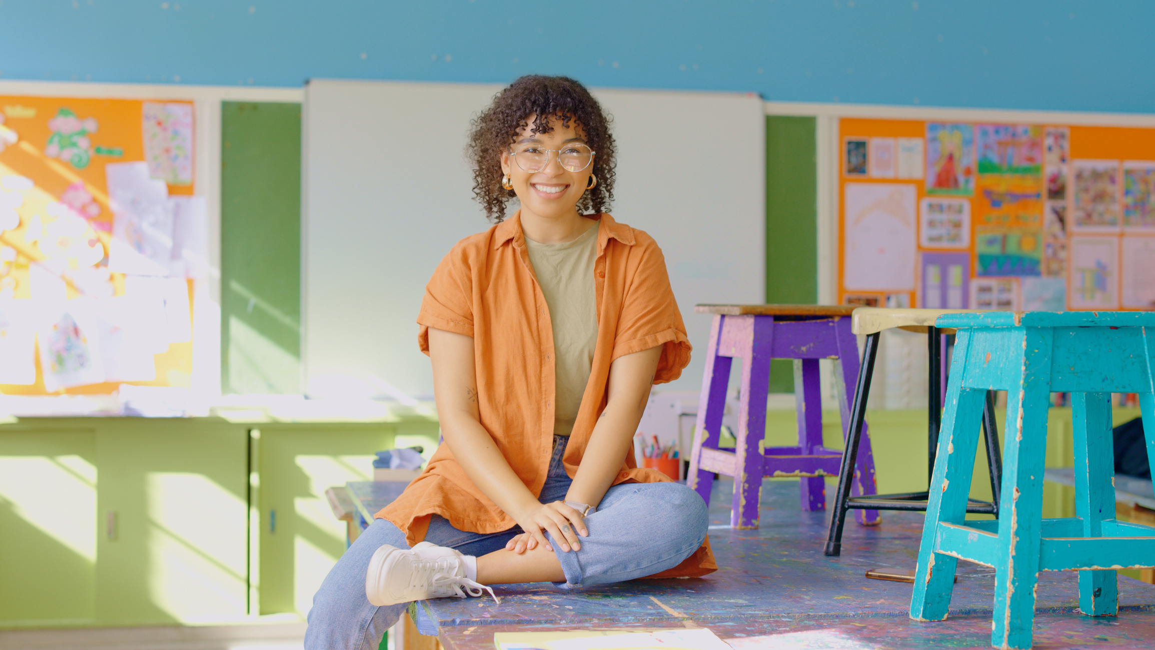 teacher sitting in classroom