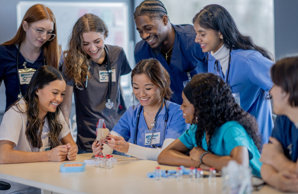 Nursing Students gathered around table