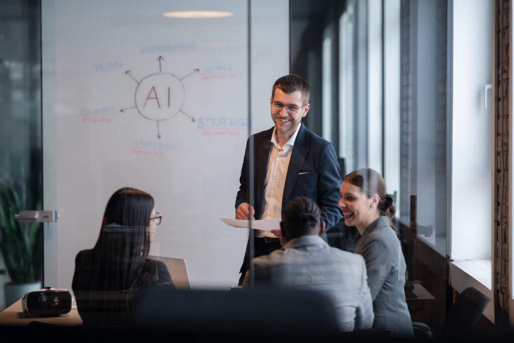 businessman presenting to small group of business people 