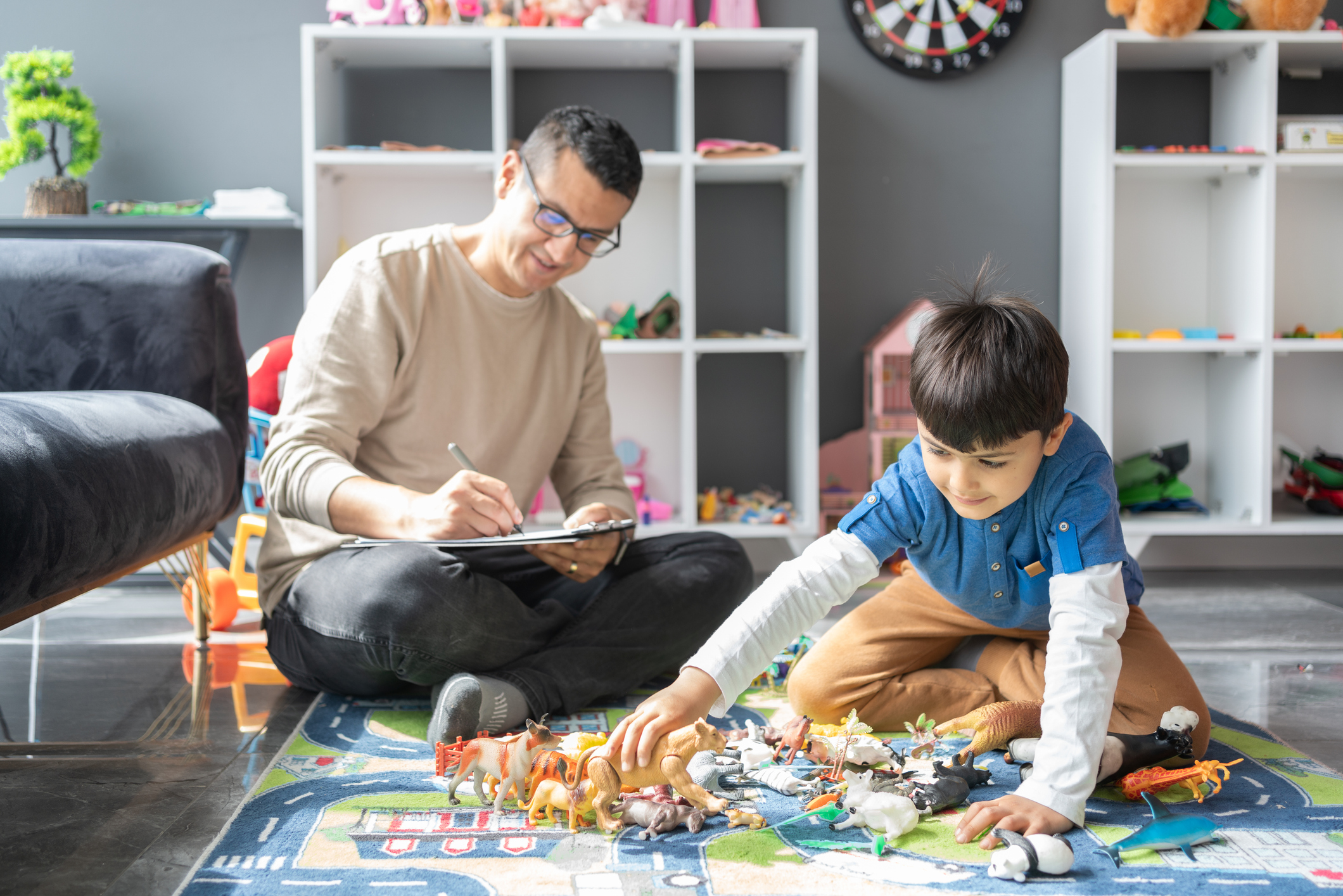 therapist helping child