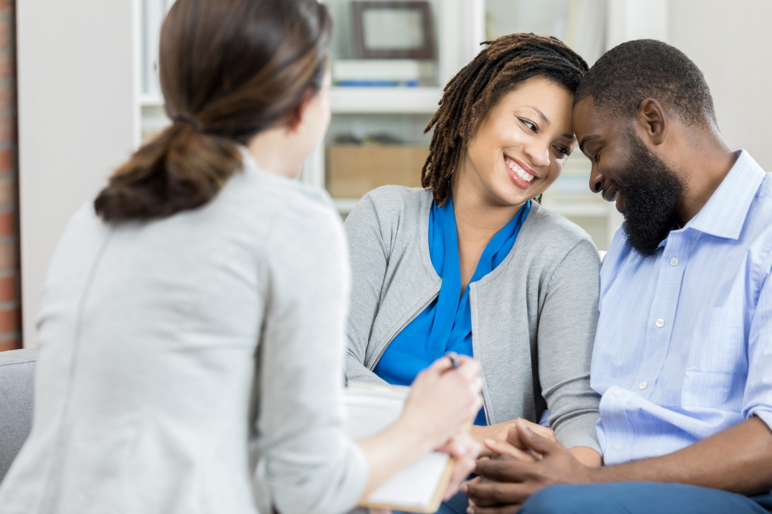 A group of people sitting on a couch