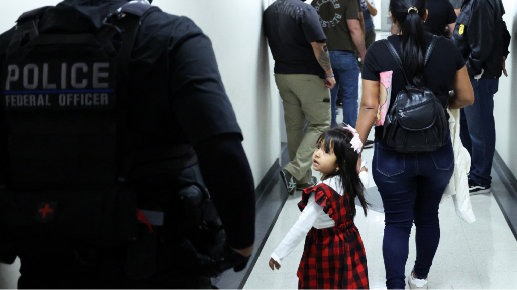 A girl walking in a hallway