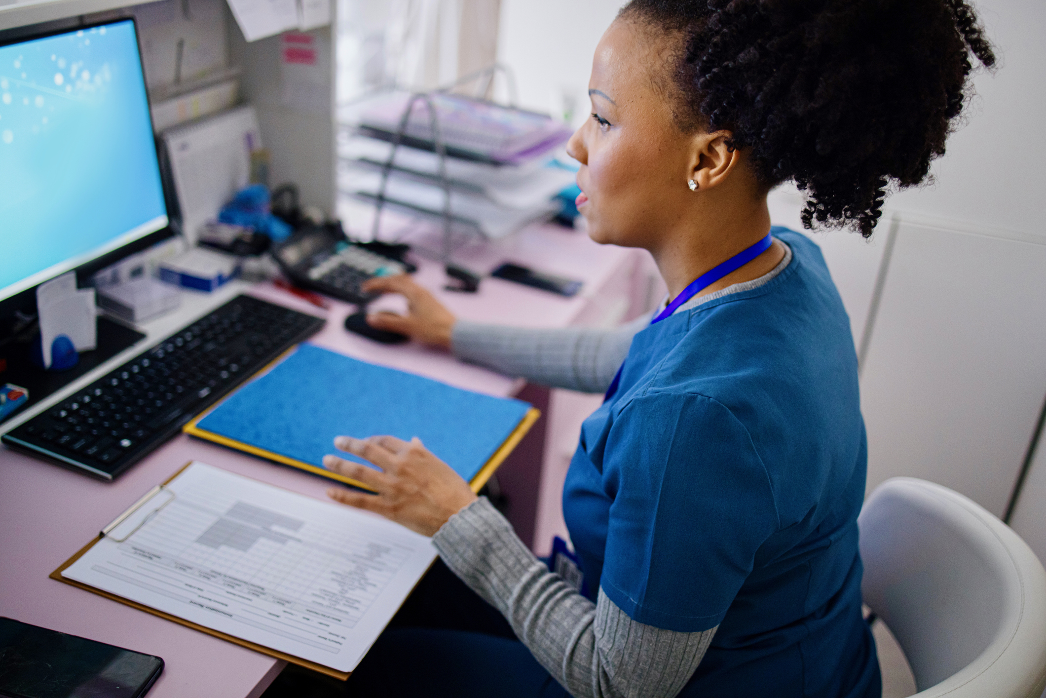 A woman sitting at a desk