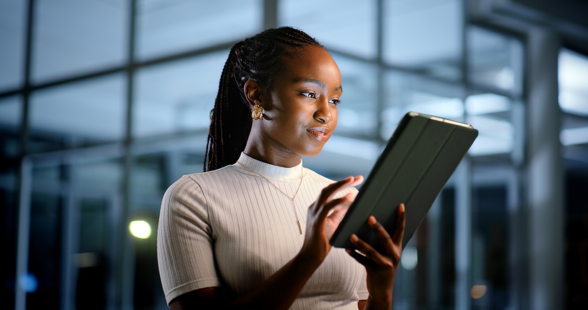 A woman holding a tablet
