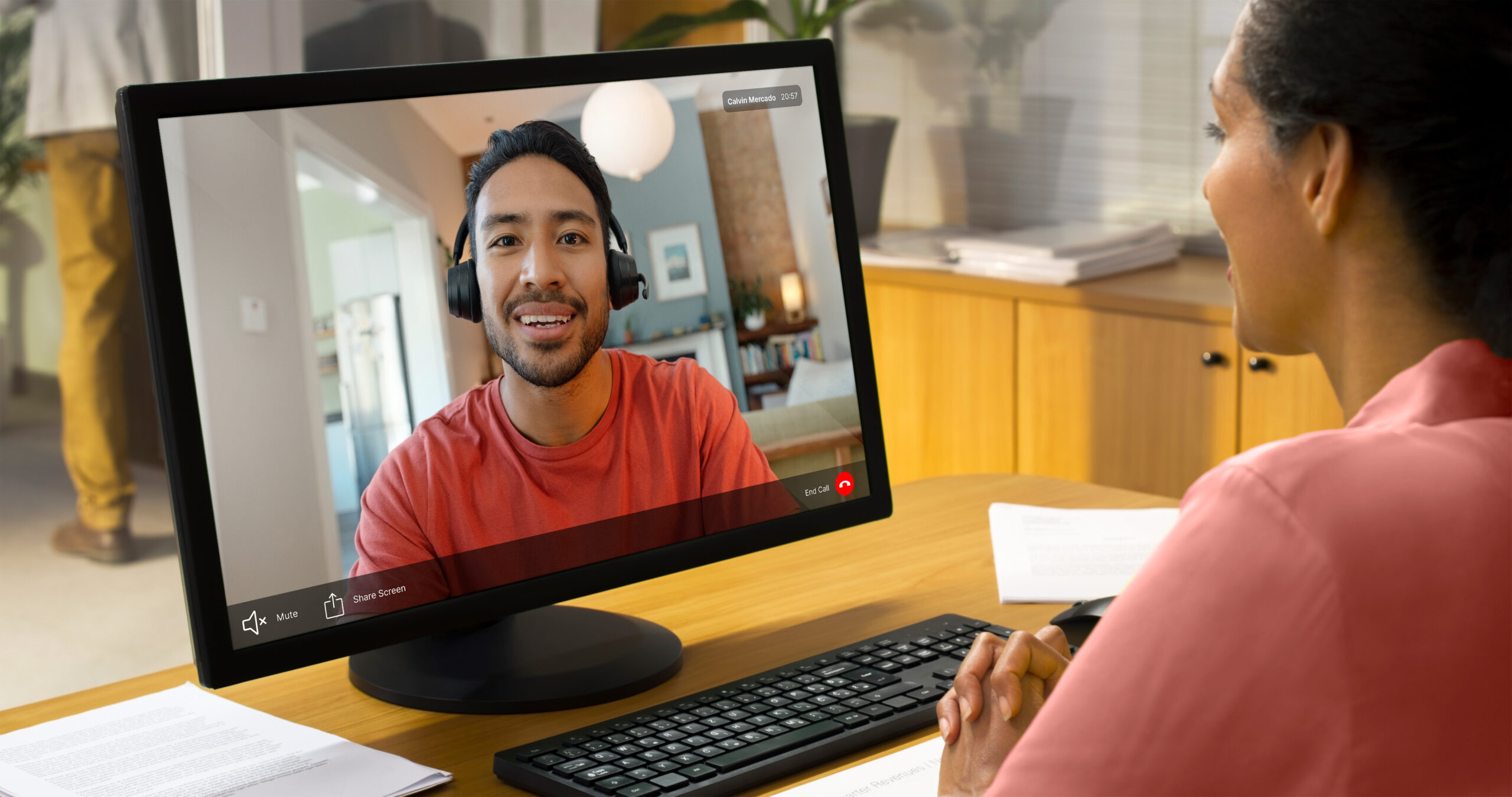 A man talking to a woman over a video call
